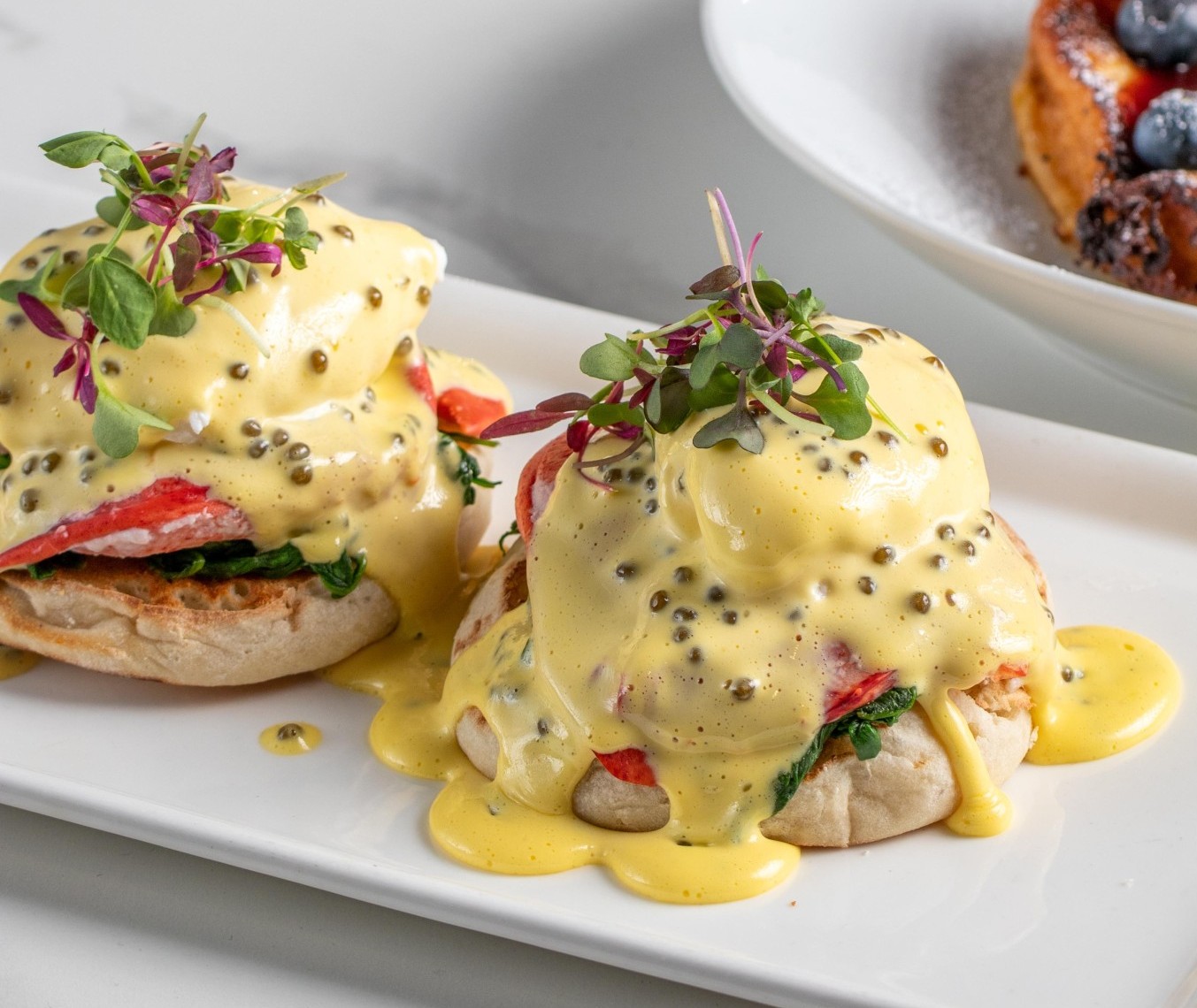 Image of two well presented Eggs Benedict's