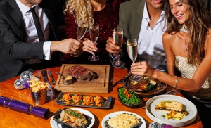 People eating STK and celebrating!