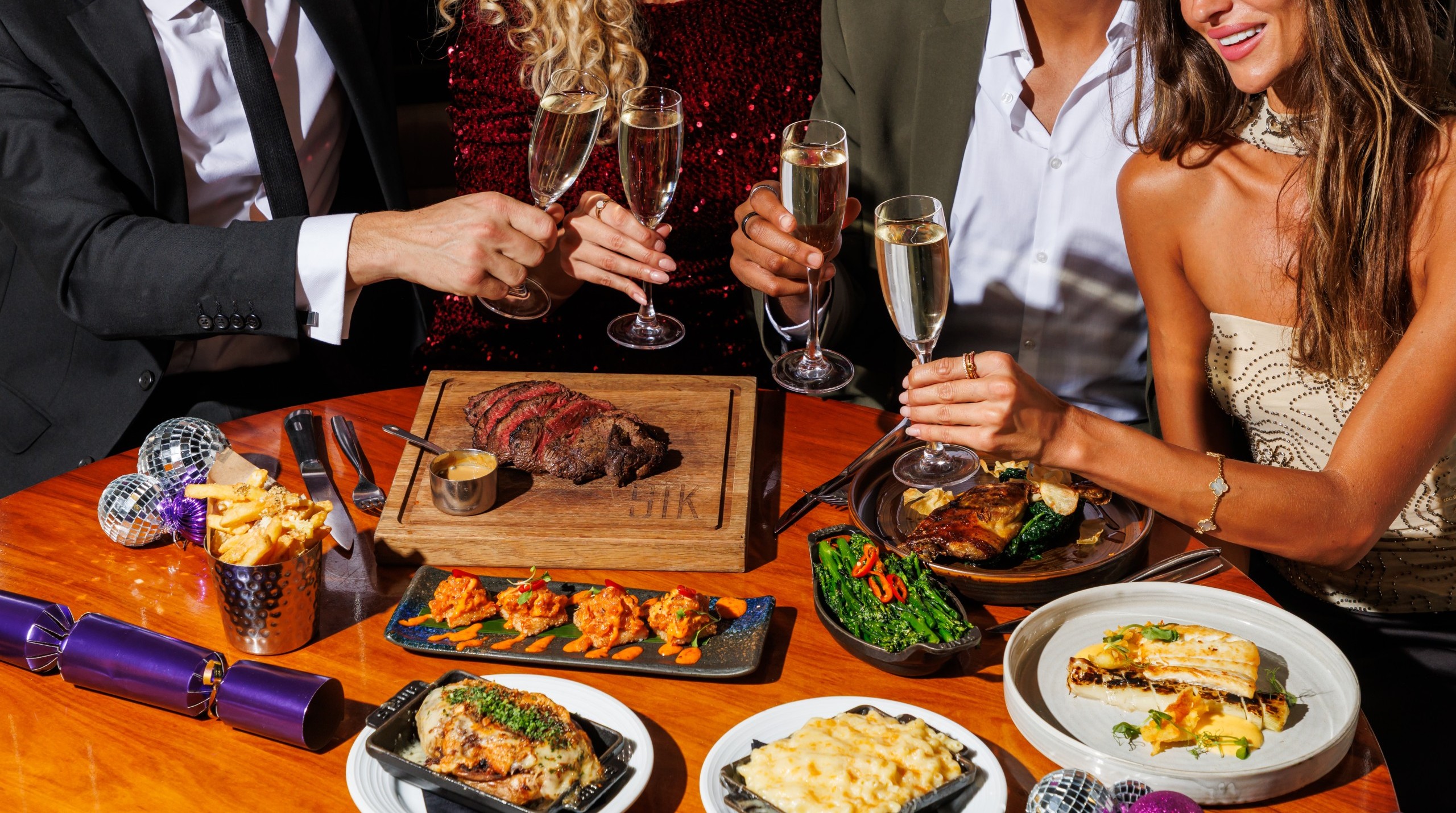 People having fun eating at a table.
